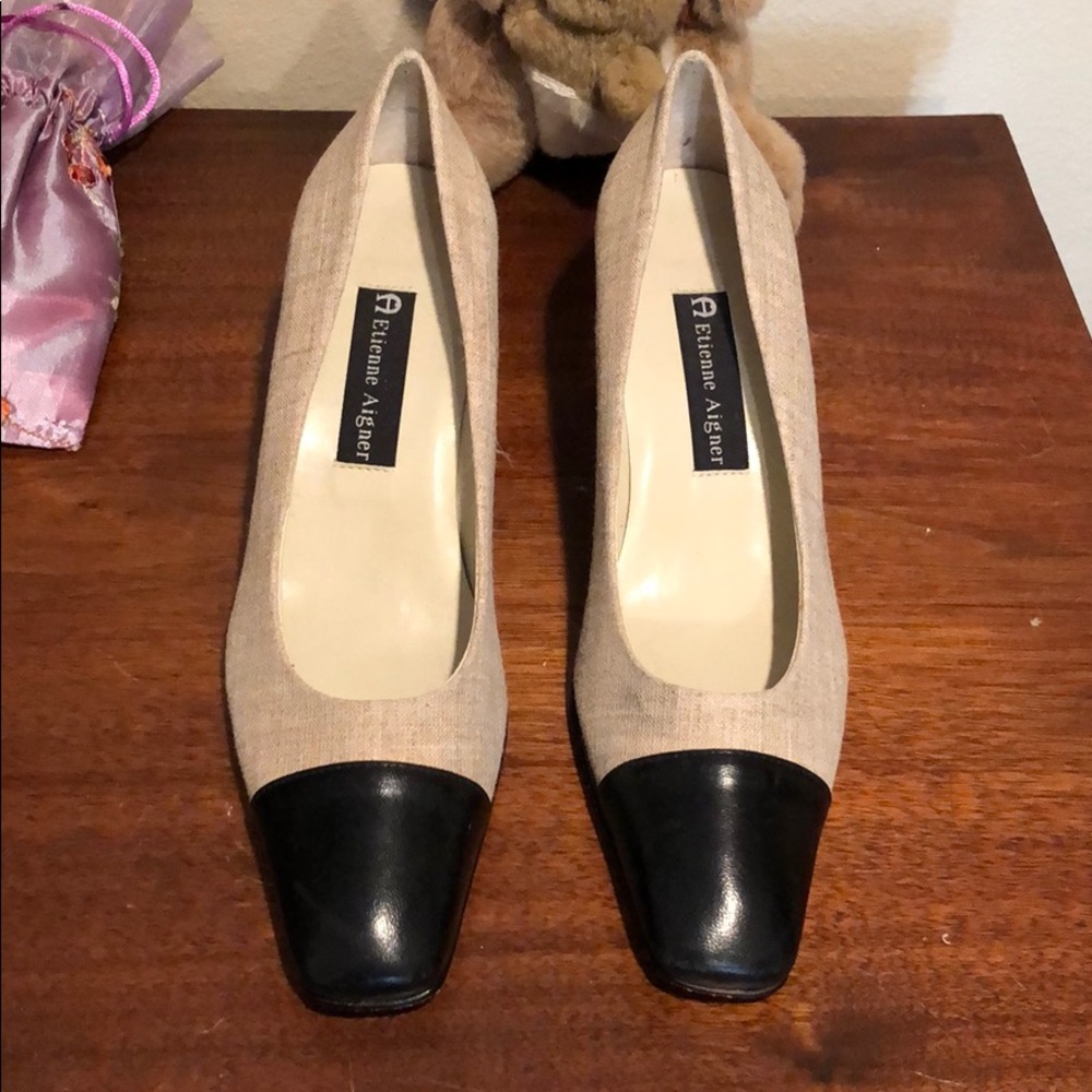 Black and cream pumps